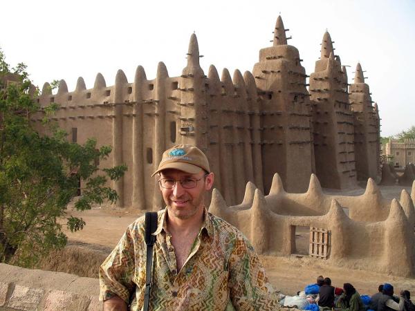 Me in front of the massive, mud brick mosque at Djenne